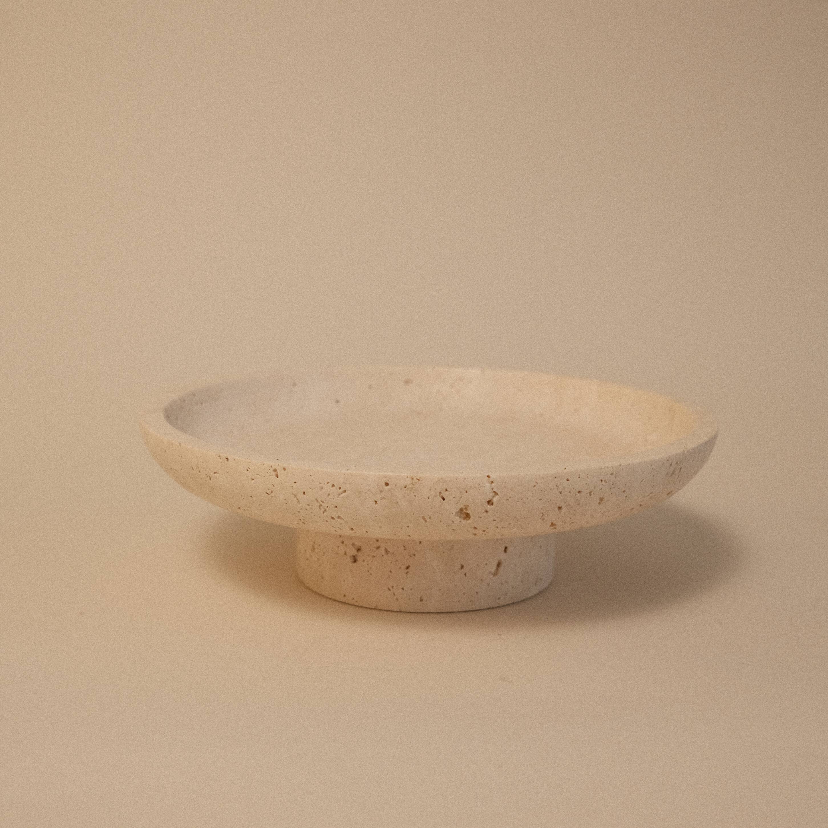 Travertine pocket emptier
