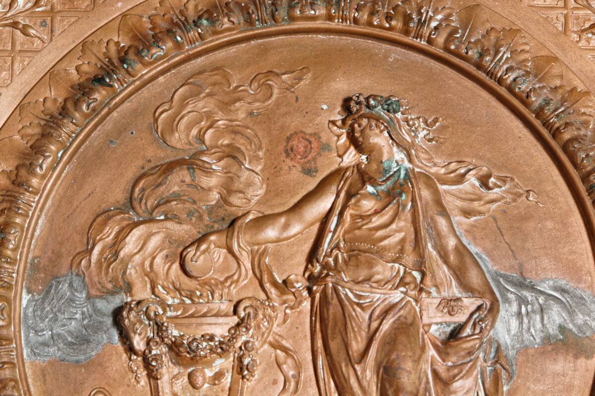 Repoussé copper plaque, early 19th century, in Neoclassical style.