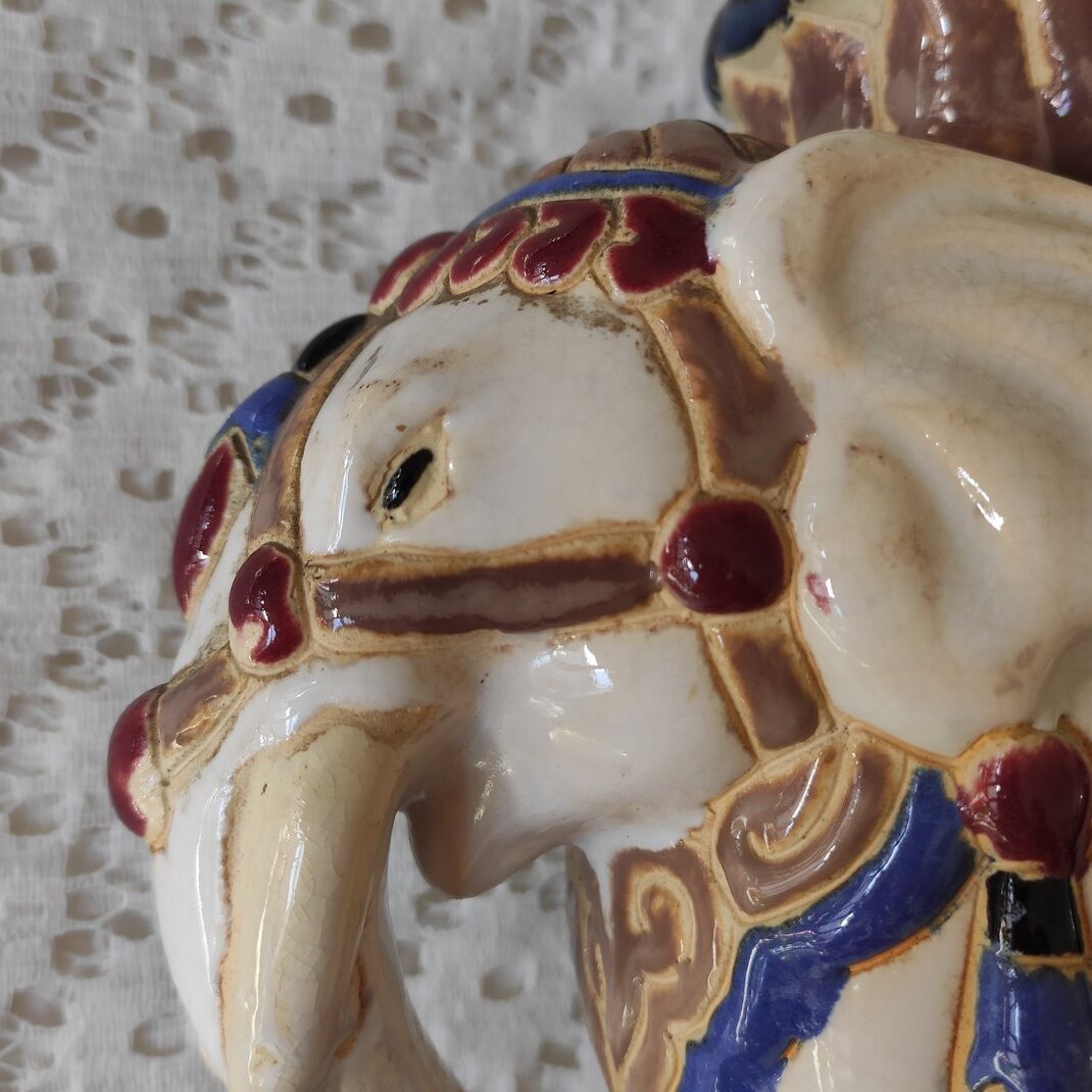 Enamelled ceramic plant holder