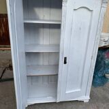 Vintage two-door wardrobe in painted white wood — late 19th century Hungarian style.