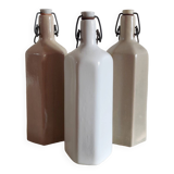 Trio of large hexagonal stoneware hot water bottles