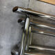 Table basse en verre fumé tubes métal chromé dans le goût Willy Rizzo