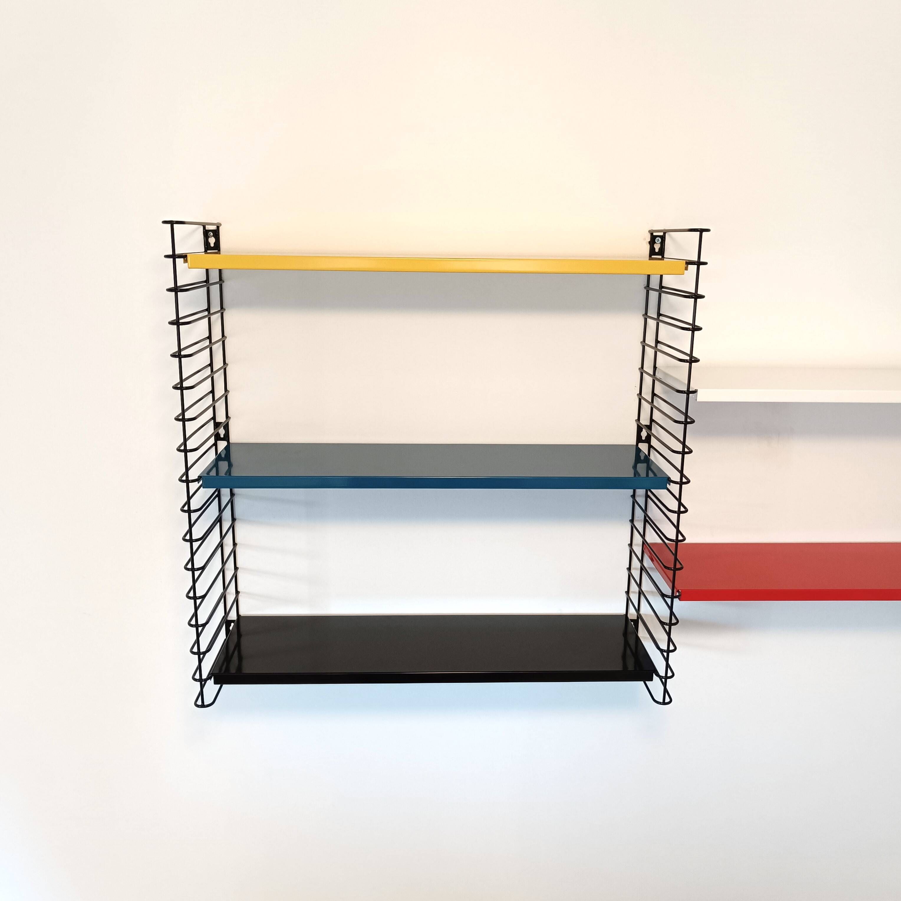 Tomado wall unit with metal shelves by A. Dekker