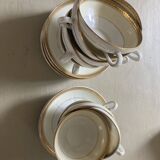 Vintage Limoges porcelain chocolate teacups in pastel yellow and gold