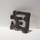Gimmik 1 sandstone wall sculpture