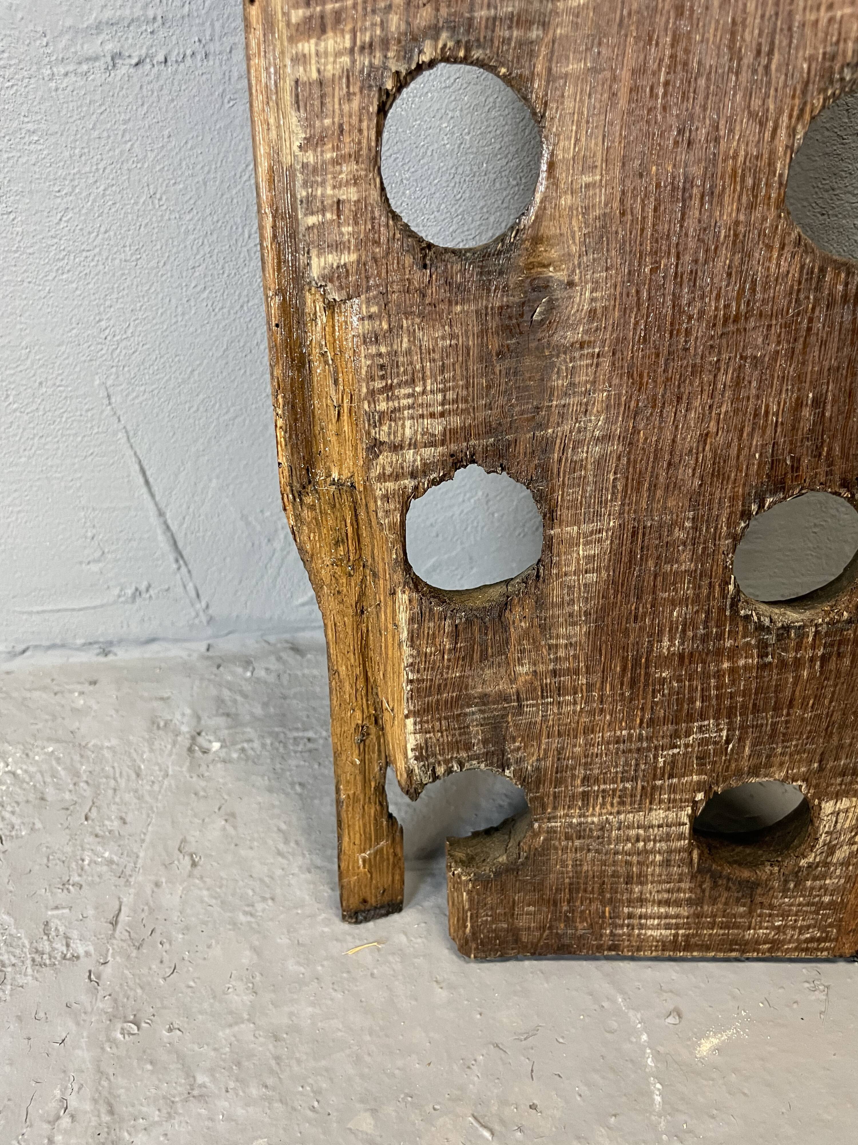 Brutalist oak bottle rack, late nineteenth century