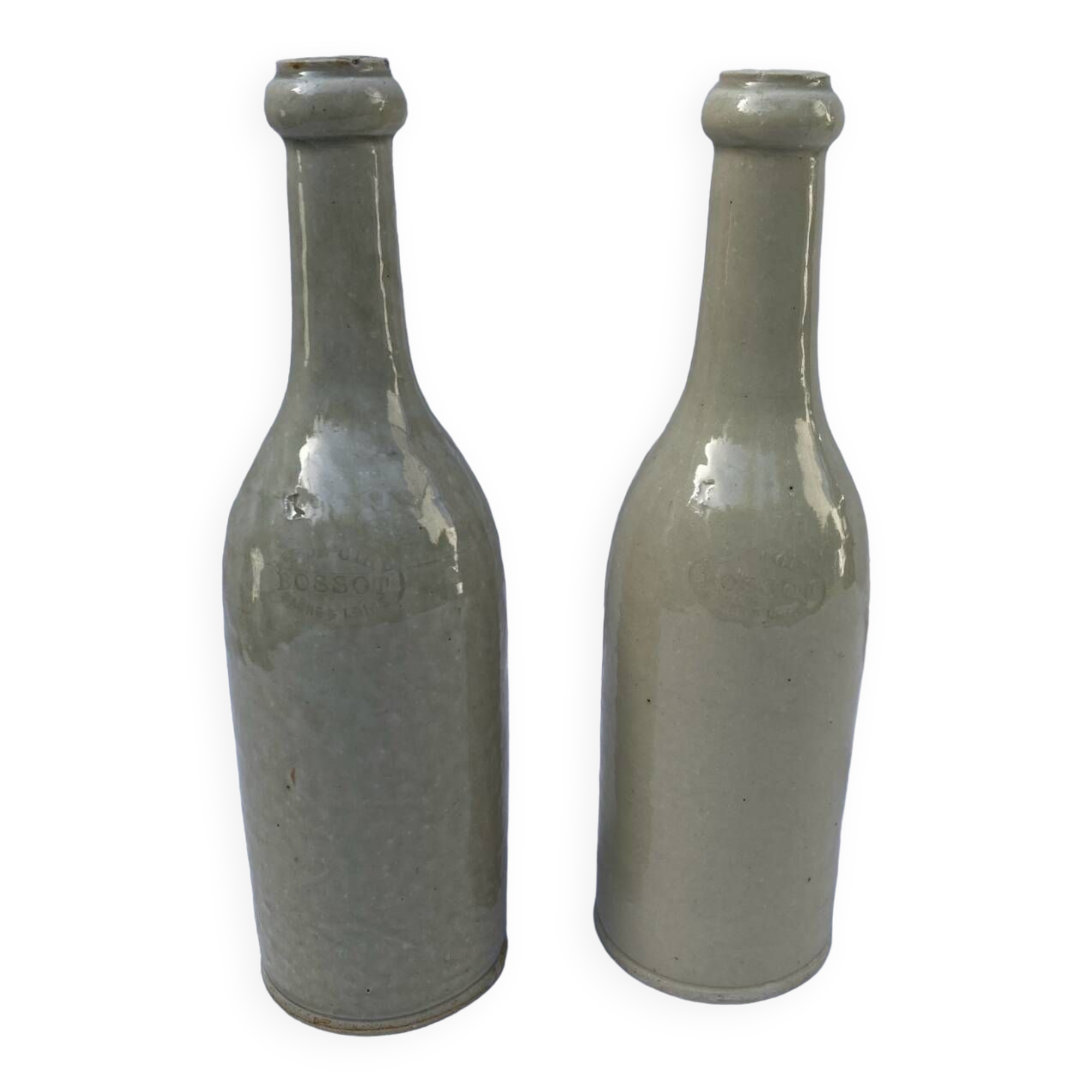 Pair of old Bossot stoneware bottles