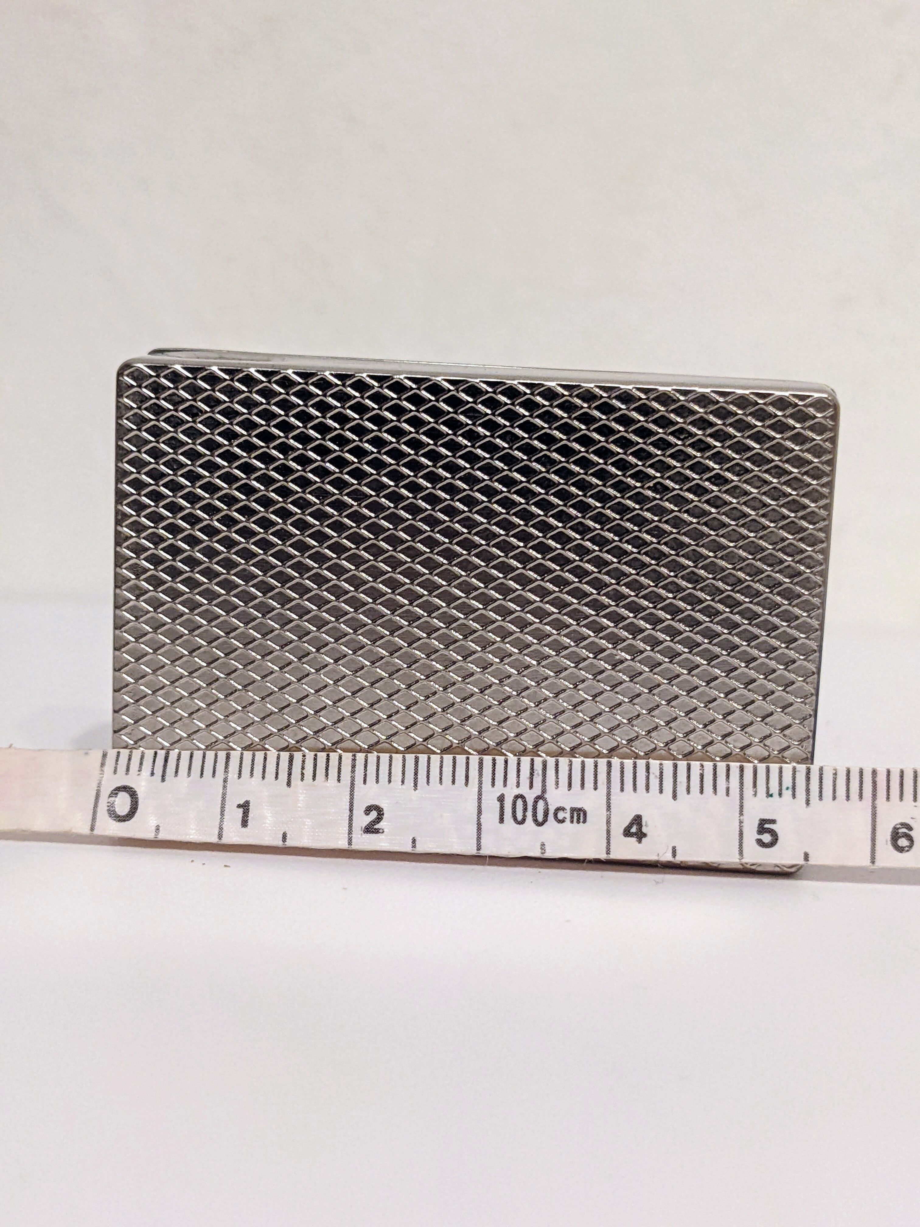 Old lighter new picoflam new condition in its small pocket leather case some stains on the et