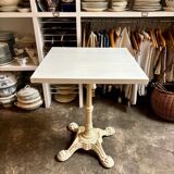 Bistro table in beige cast iron and ecru wood