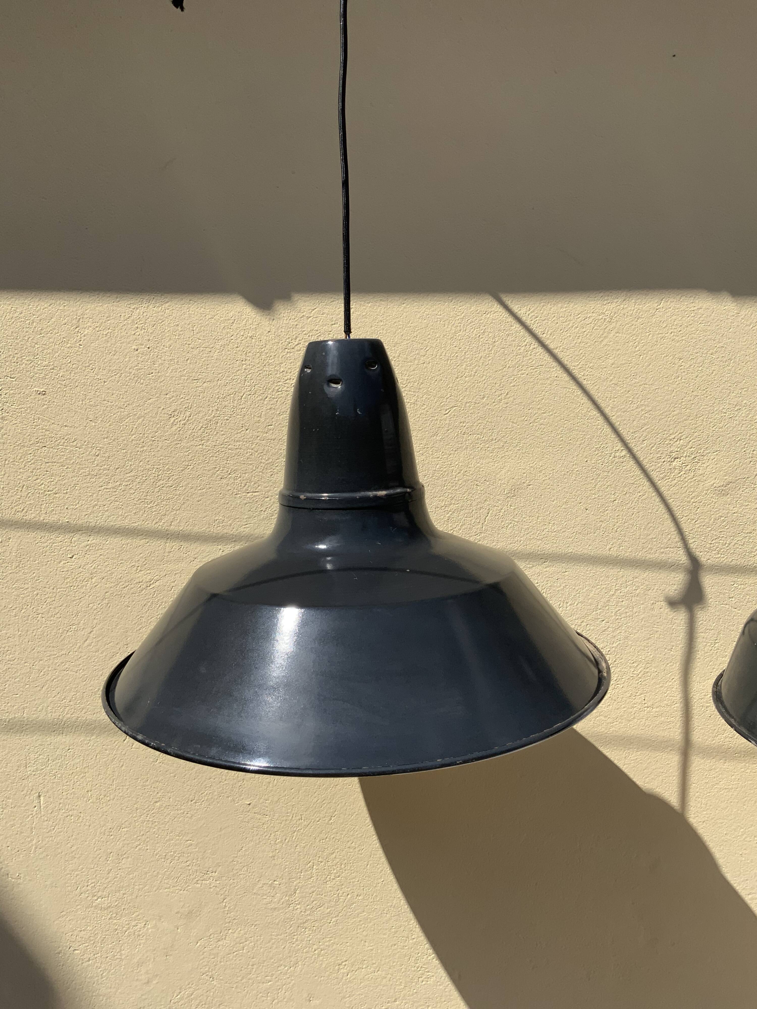 Three industrial suspensions in black and white enamelled sheet metal large format