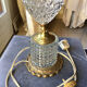 Pied de lampe en laiton et cristal