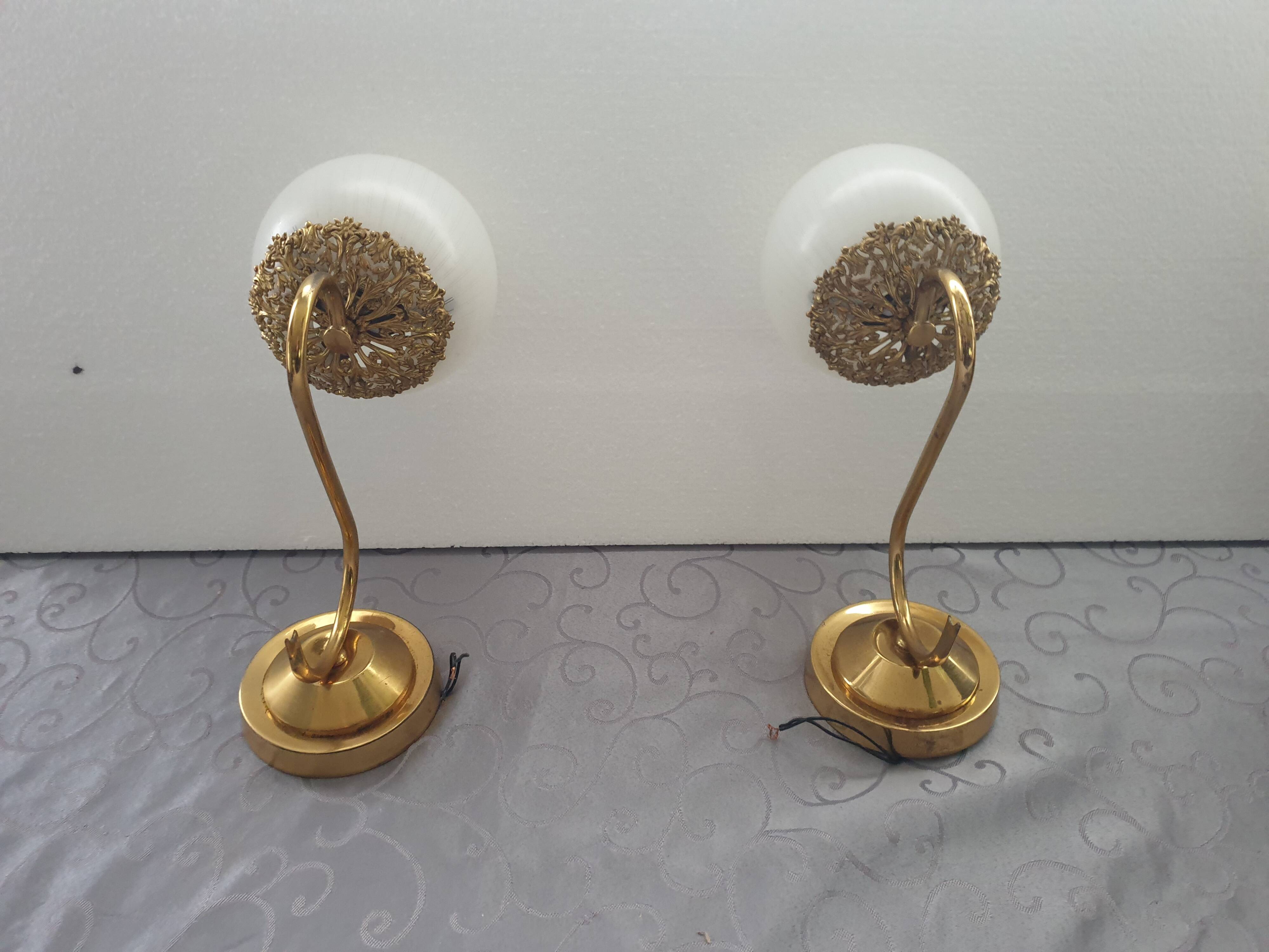 Pair of brass and glass wall lights