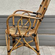 Fauteuil vintage en rotin type paon – années 70