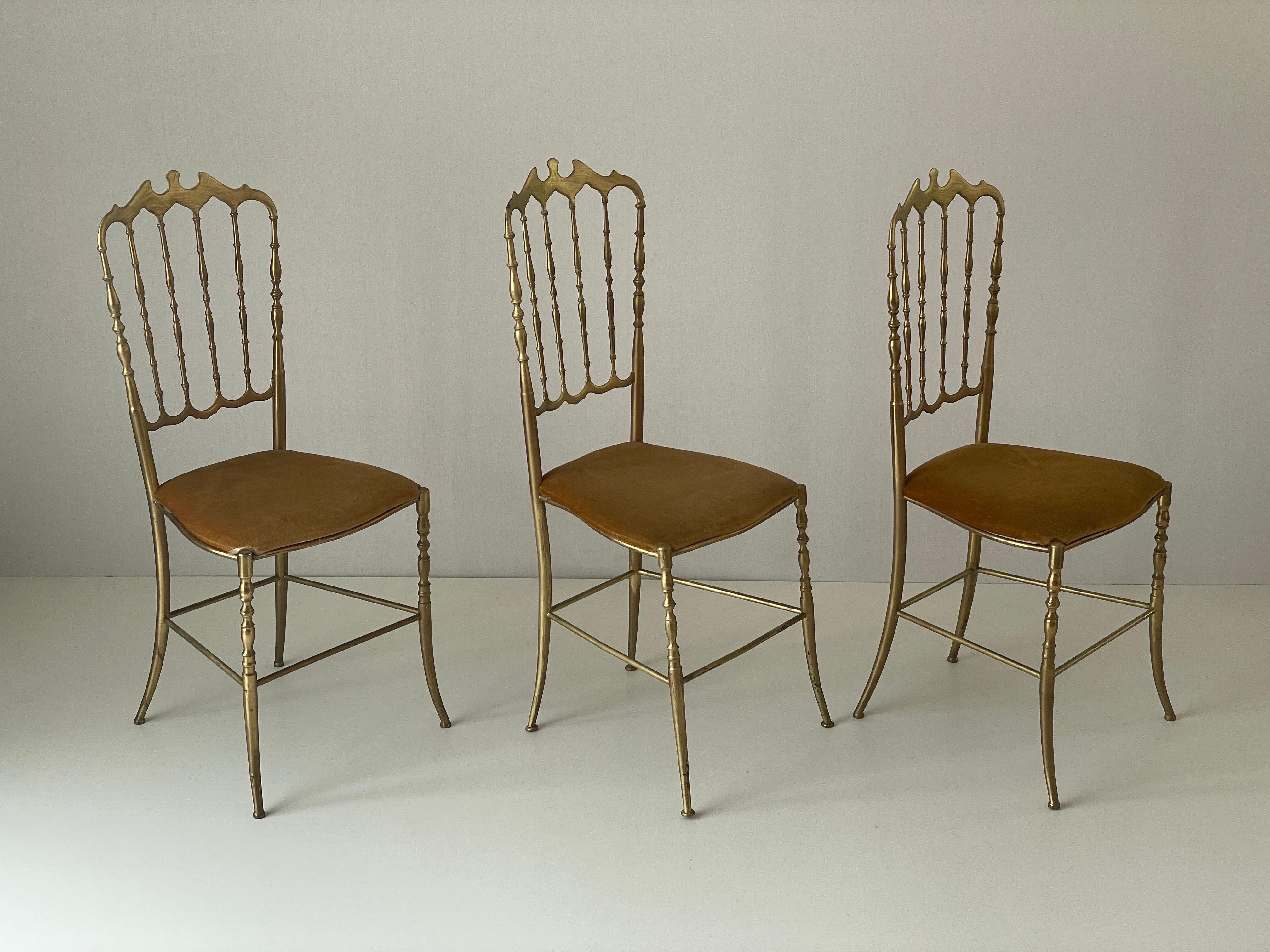 Set of 3 Chiavari chairs in brass with velvet seat and high back, 1950s, Italy.