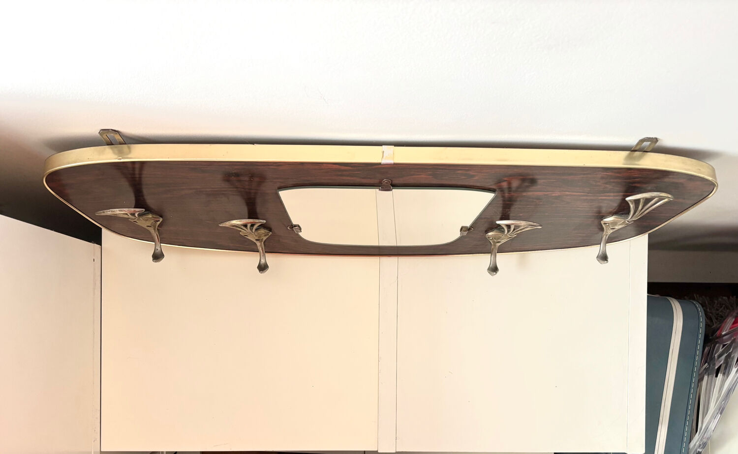 Wood and brass coat rack, 1960
