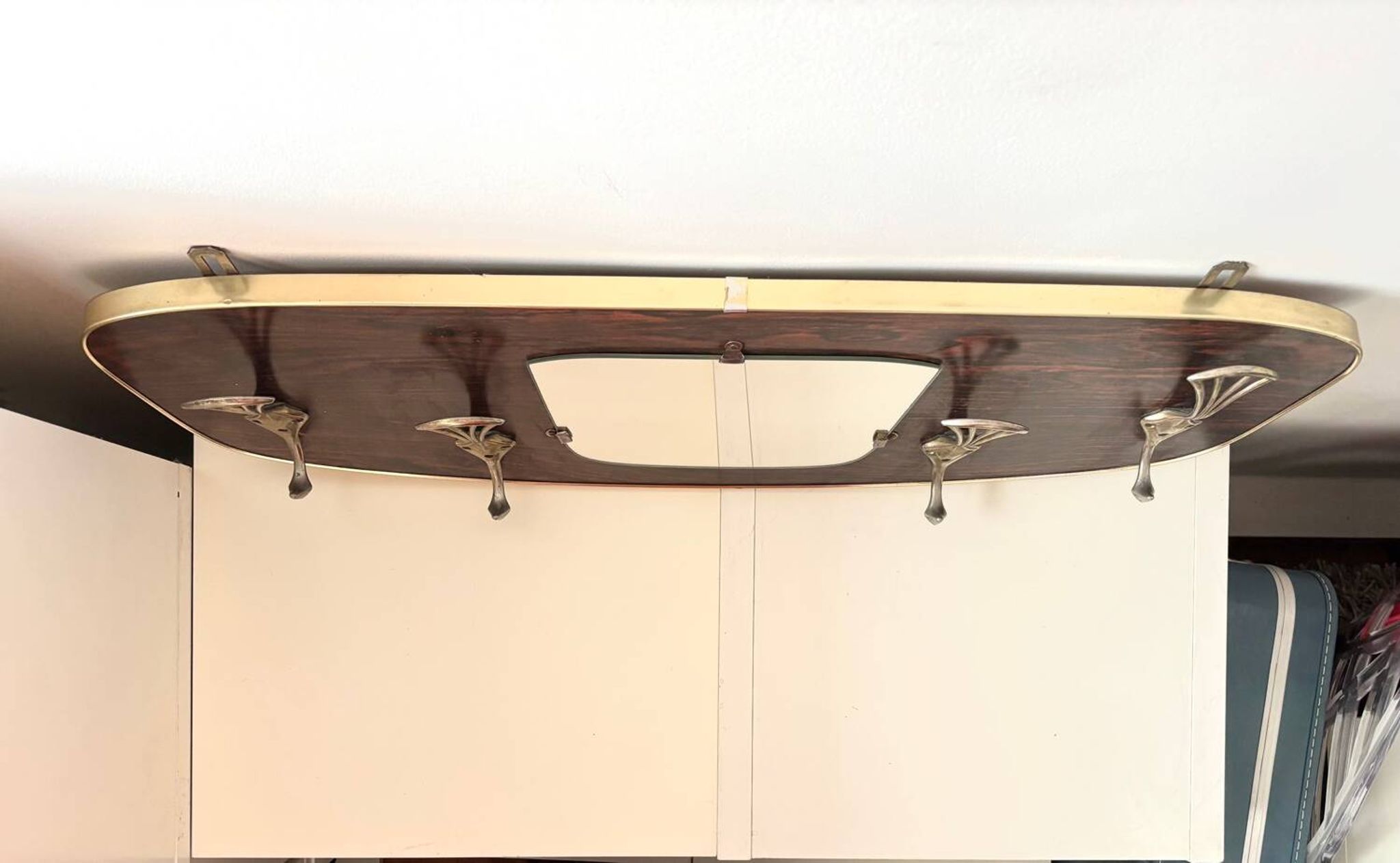 Wood and brass coat rack, 1960