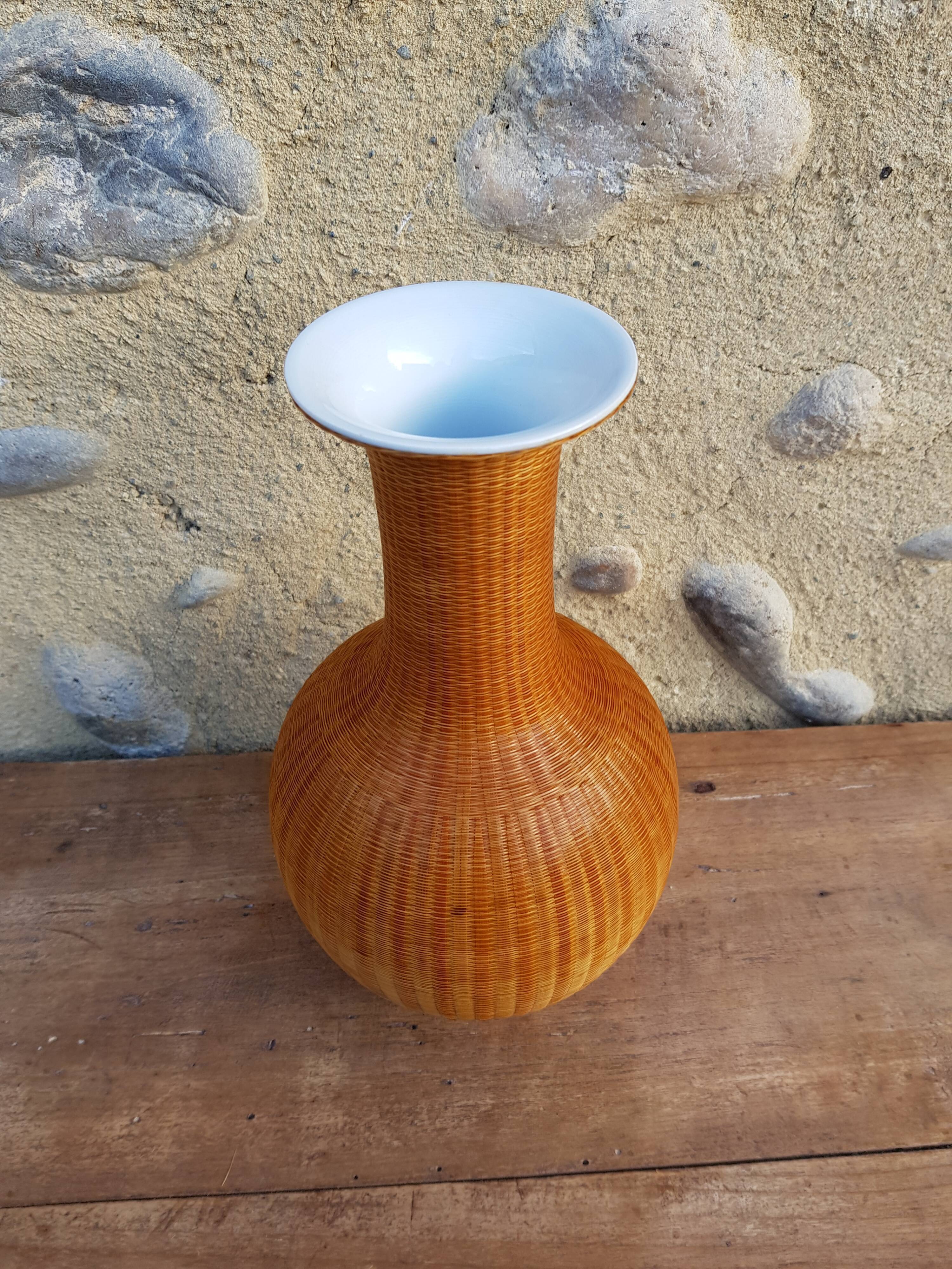 Woven straw vase