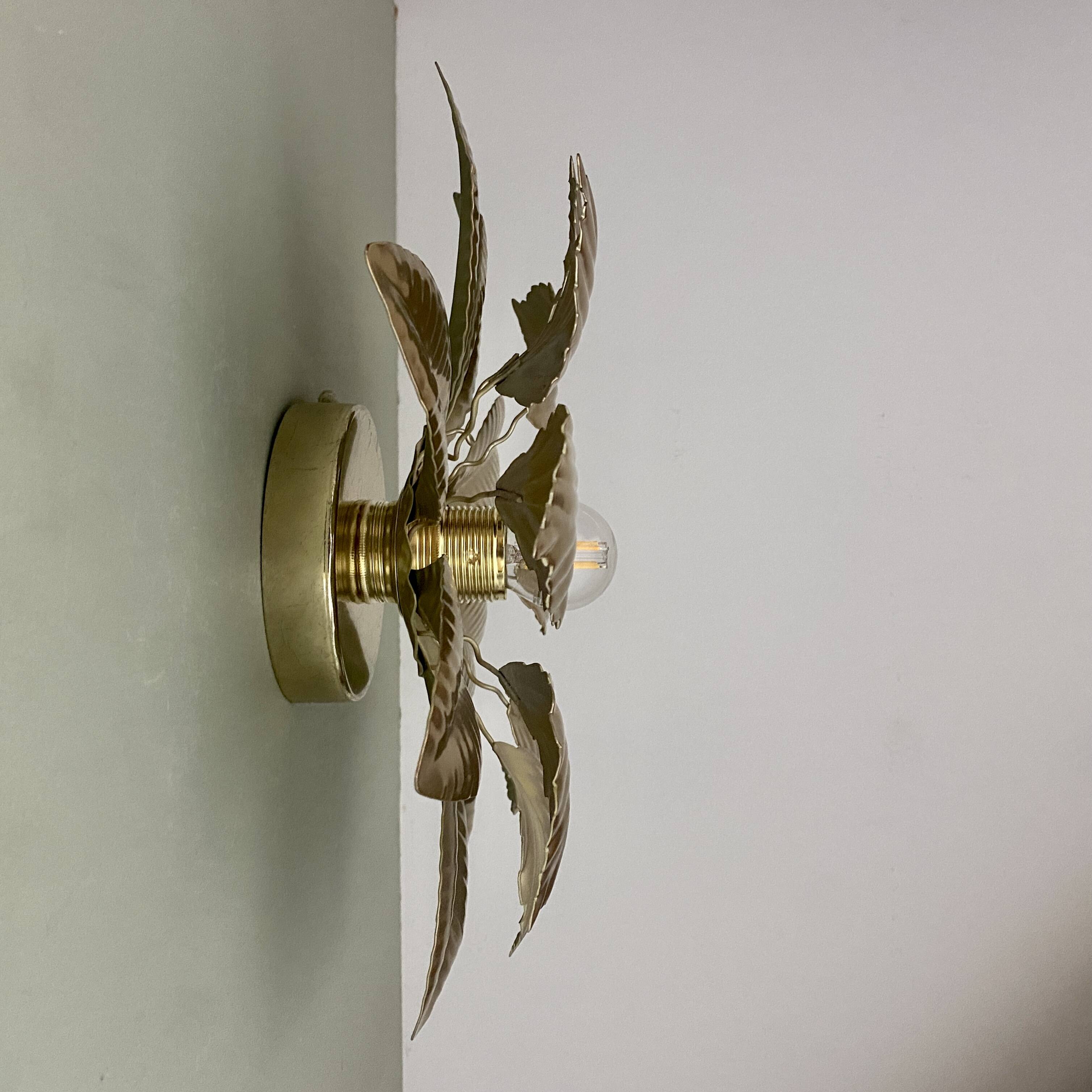Vintage wall light in gold metal