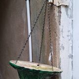Hanging planter in green earthenware