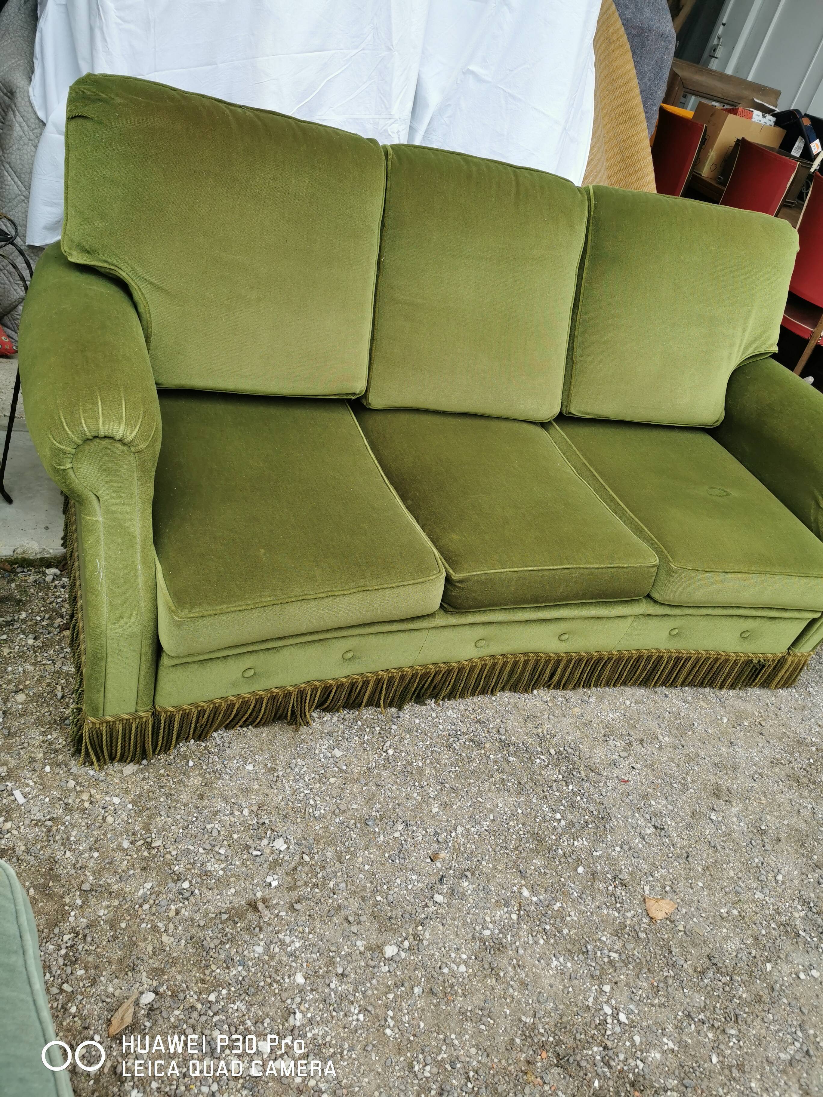 Convertible green velvet sofa