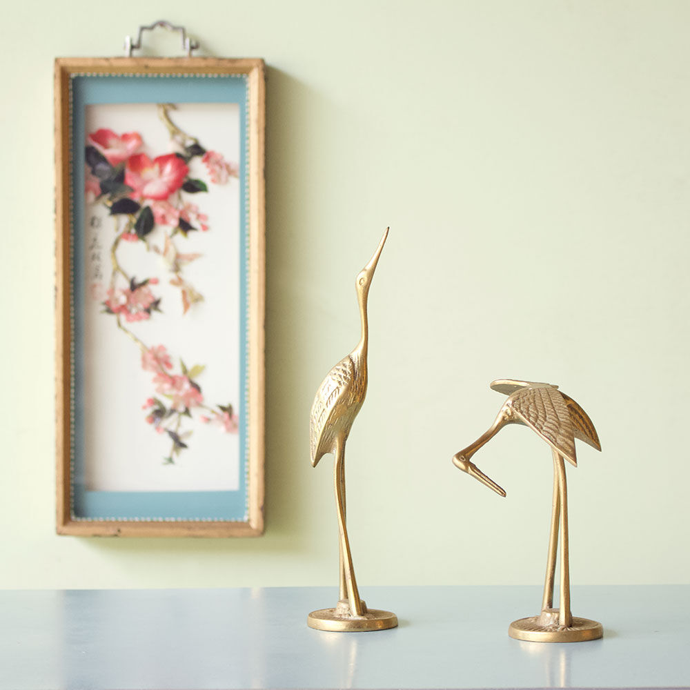 Pair of herons in brass