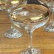 Champagne coupes or cocktail glasses with gilding