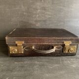 Small black grained leather travel suitcase from the 1920s