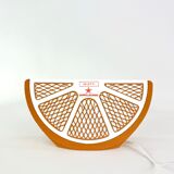 Orange quarter table lamp Seletti and Sanpellegrino