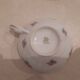 Breakfast set in white porcelain with floral decoration, 1930s.