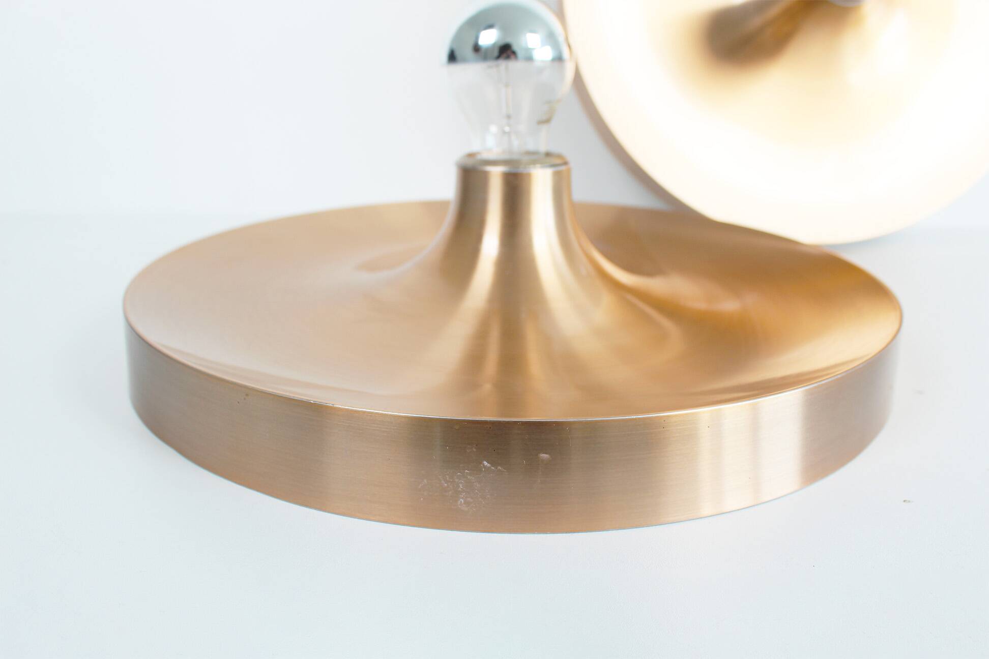 Pair of medium sized (35cm) rose gold Honsel Disc sconces selected by Charl
