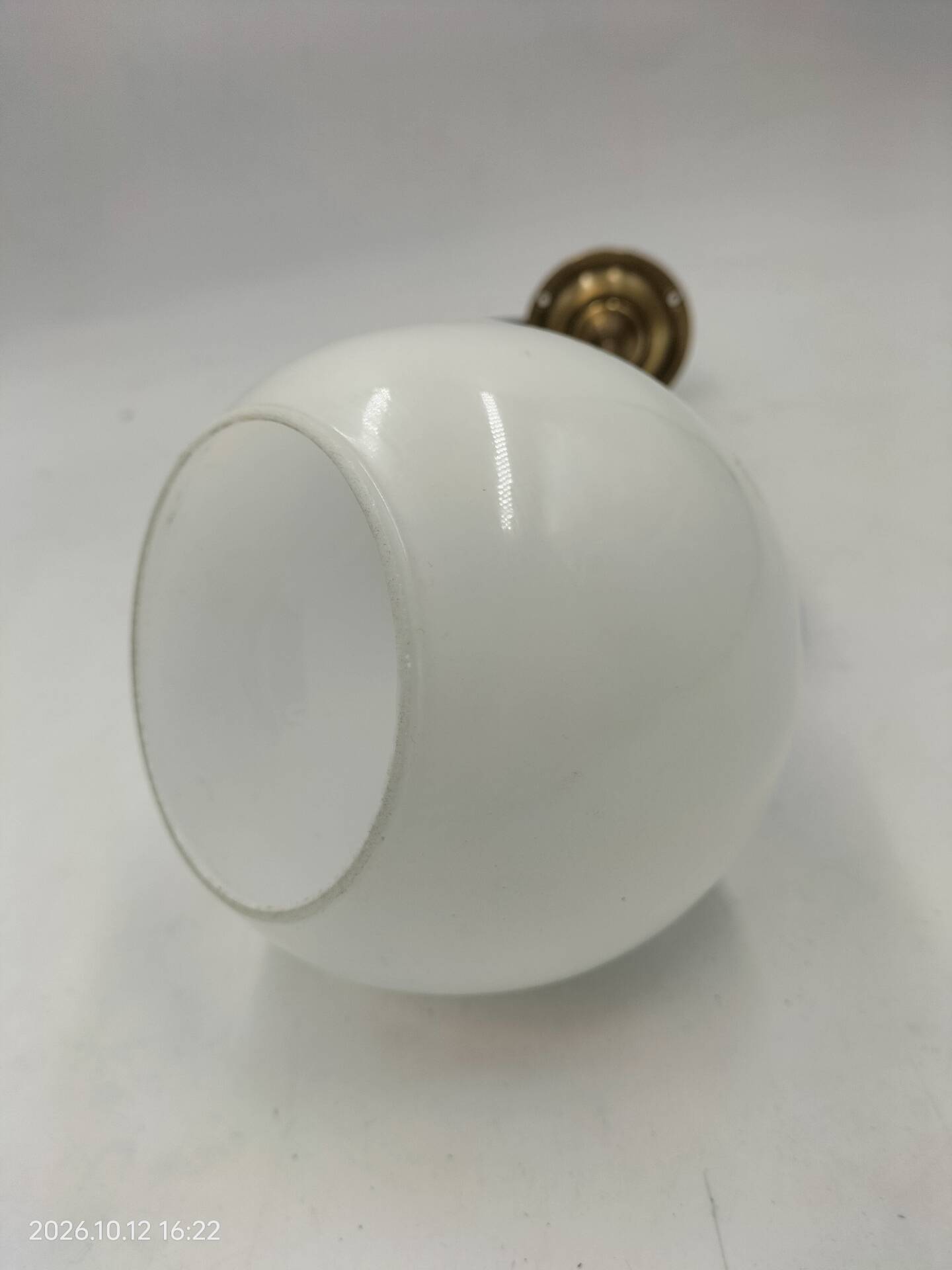 Brass and glass wall light
