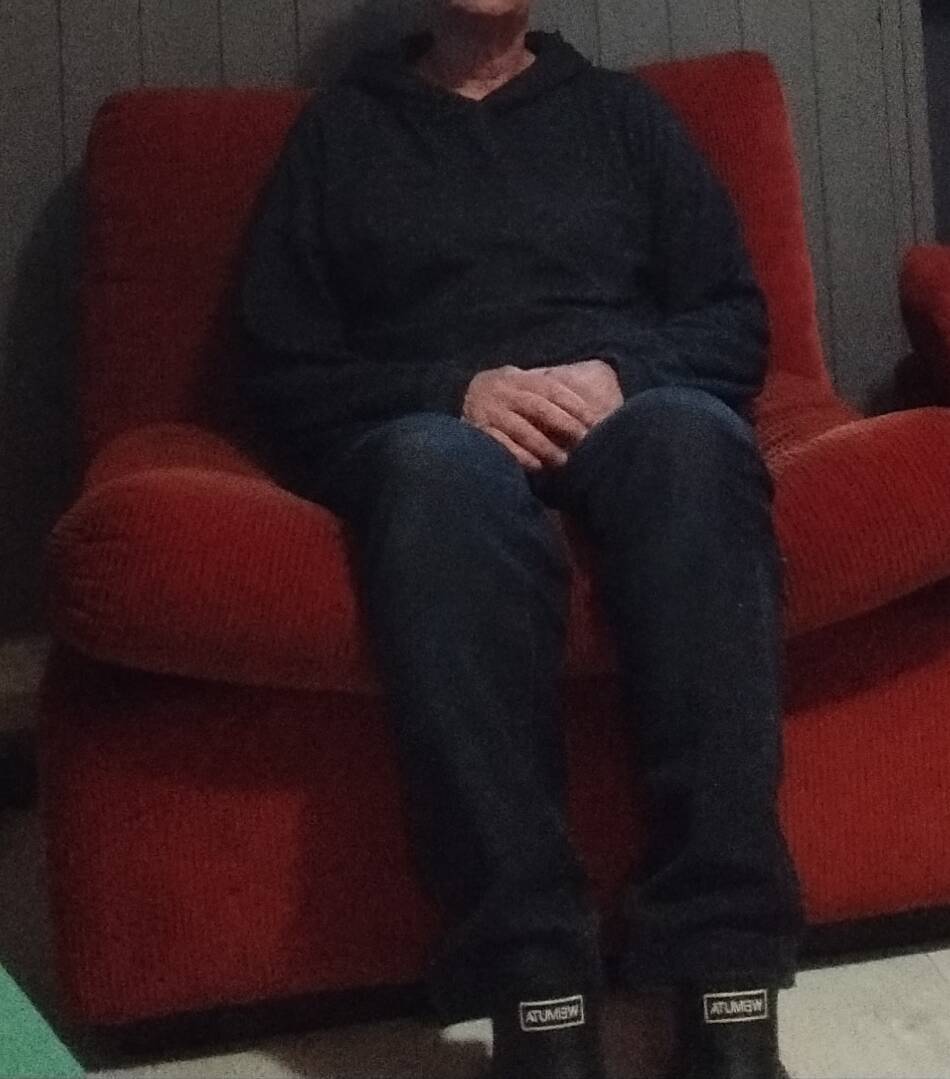 Set of three vintage armchairs. 1970s. Orange corduroy.