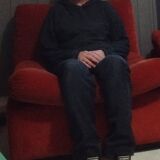 Set of three vintage armchairs. 1970s. Orange corduroy.