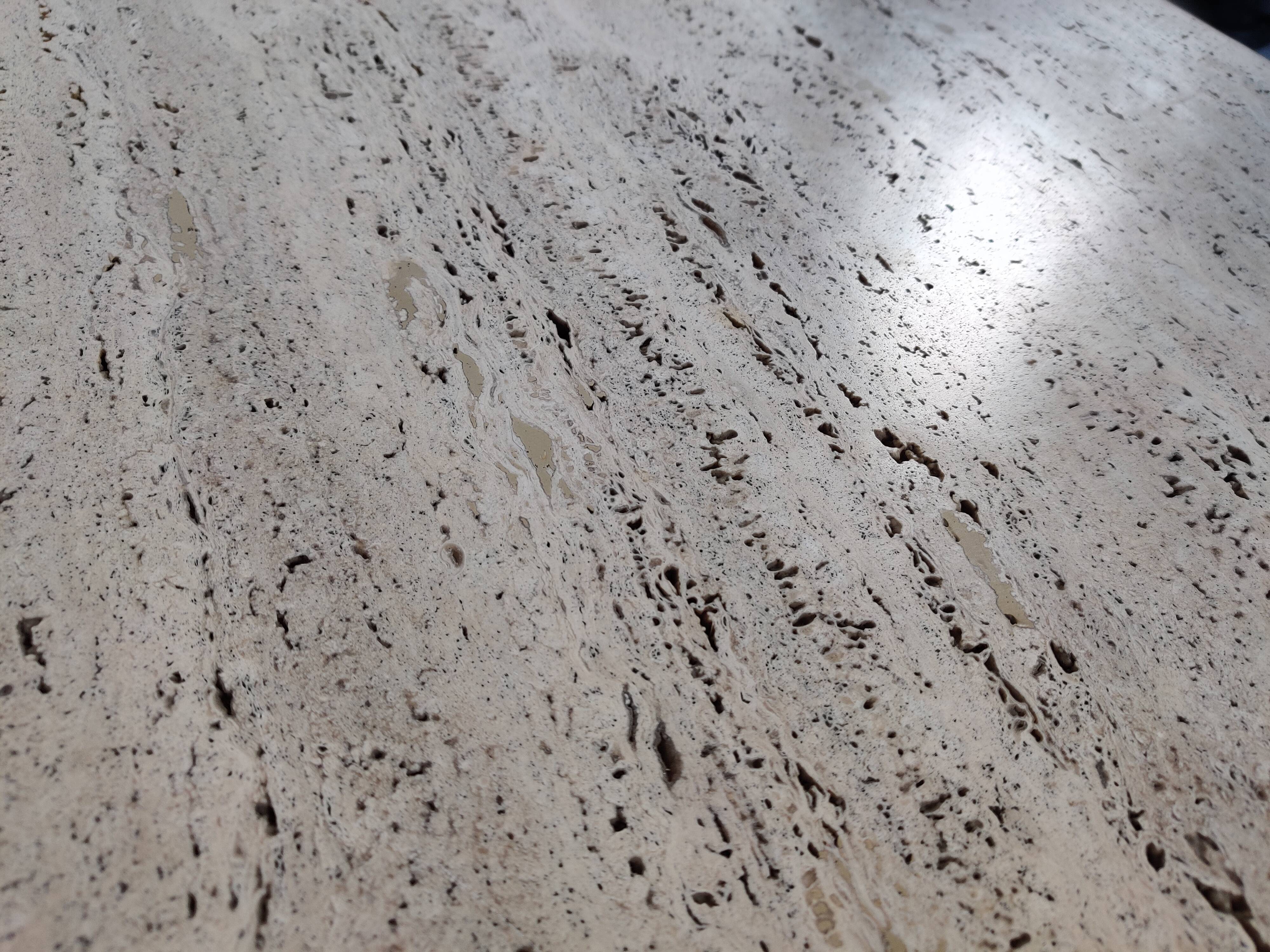 Oval travertine coffee table by Peter Draenert, 80s