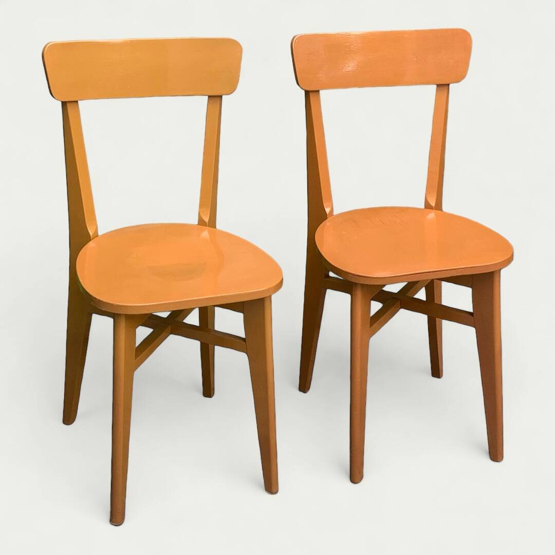 Pair of caramel bistro chairs 1950