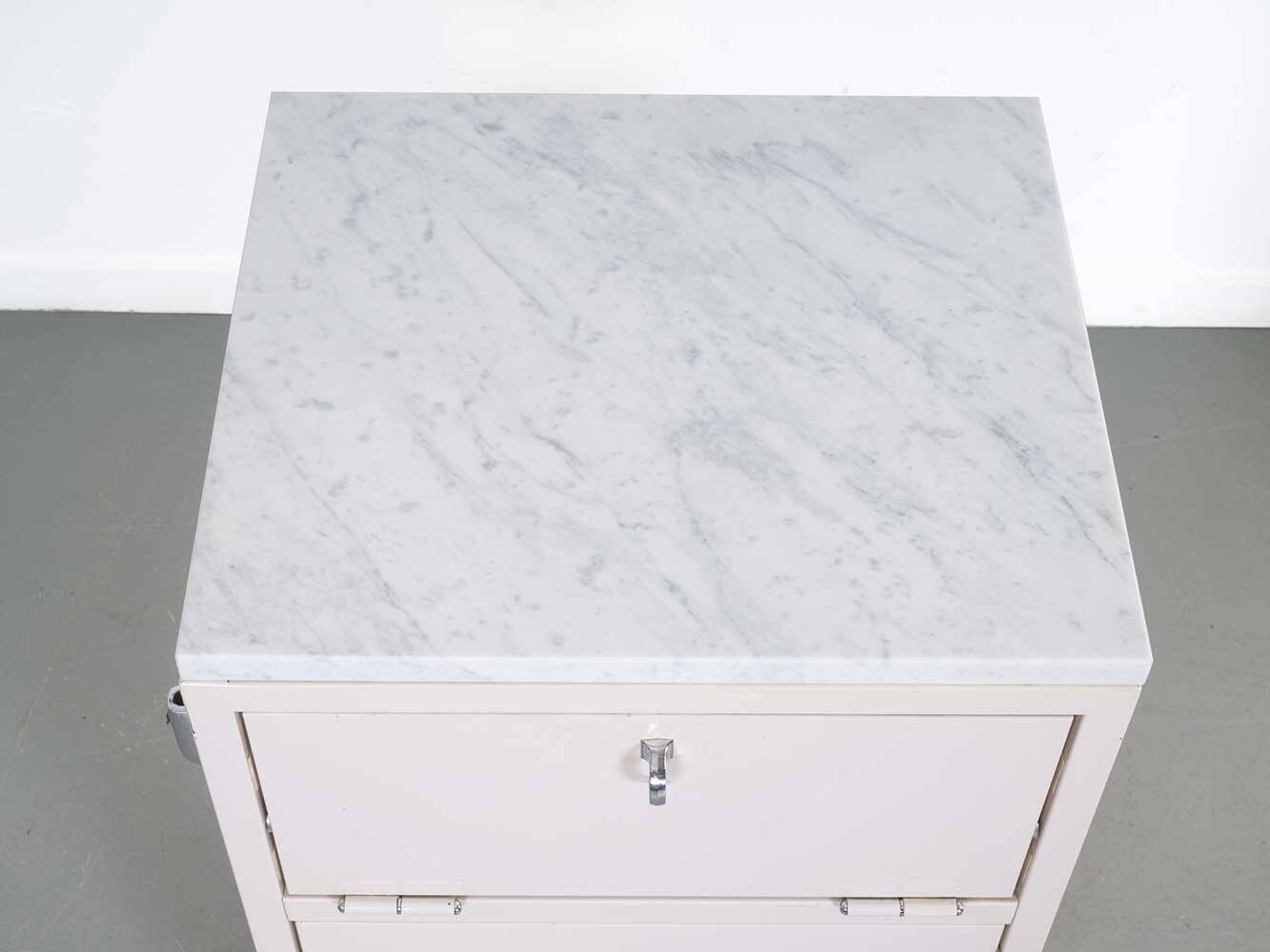 Set industrial cabinets with marble top.