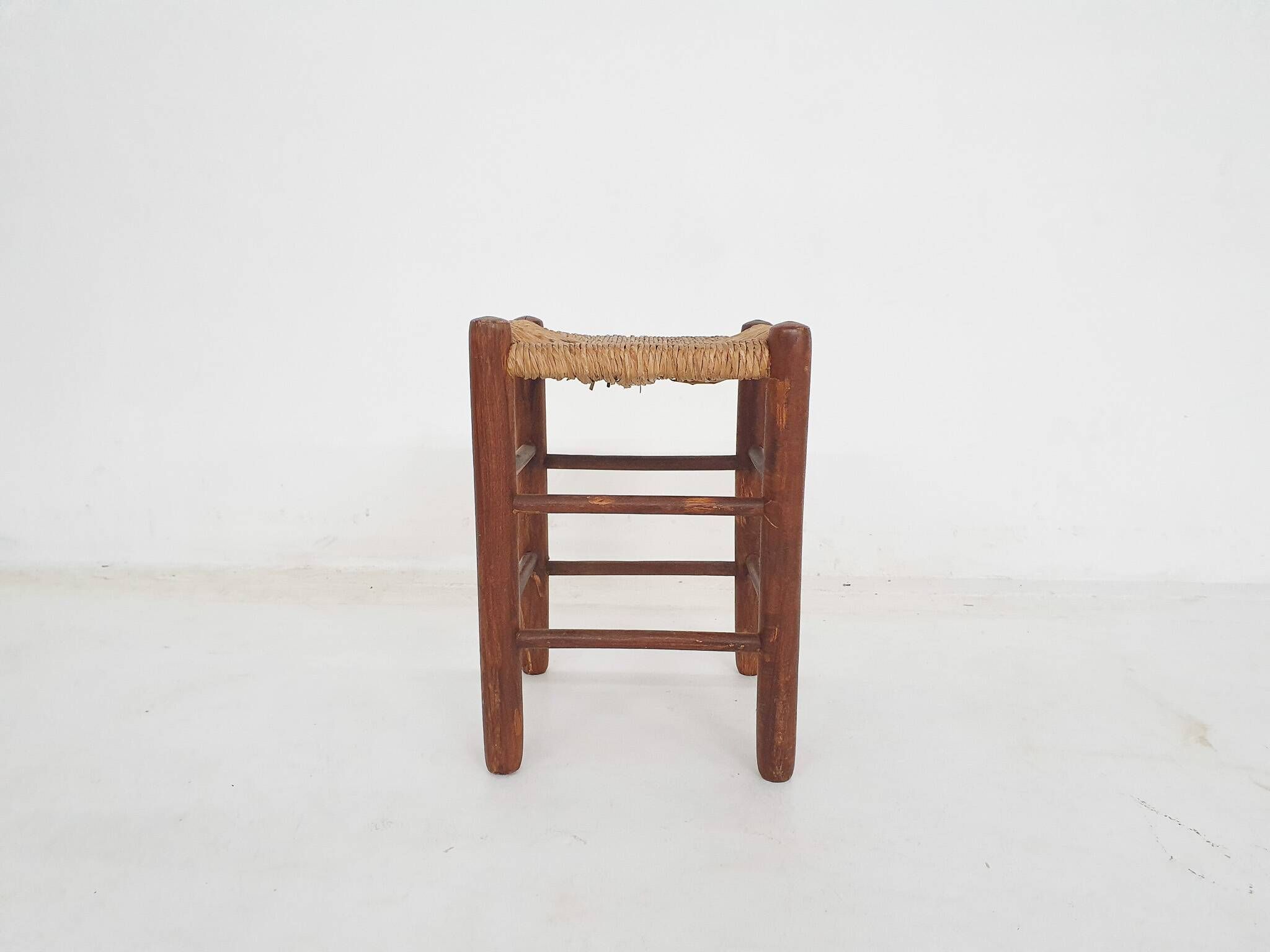 Mid-century wooden stool with rattan seating
