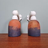 Pair of Art Deco wall sconces in multicoloured porcelain and frosted glass.