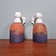 Pair of Art Deco wall sconces in multicoloured porcelain and frosted glass.
