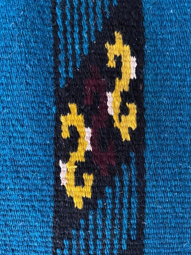 Romanian handwoven carpet with blue ground and yellow details