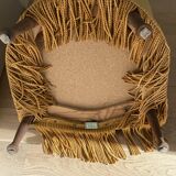 Velvet armchair with fringes