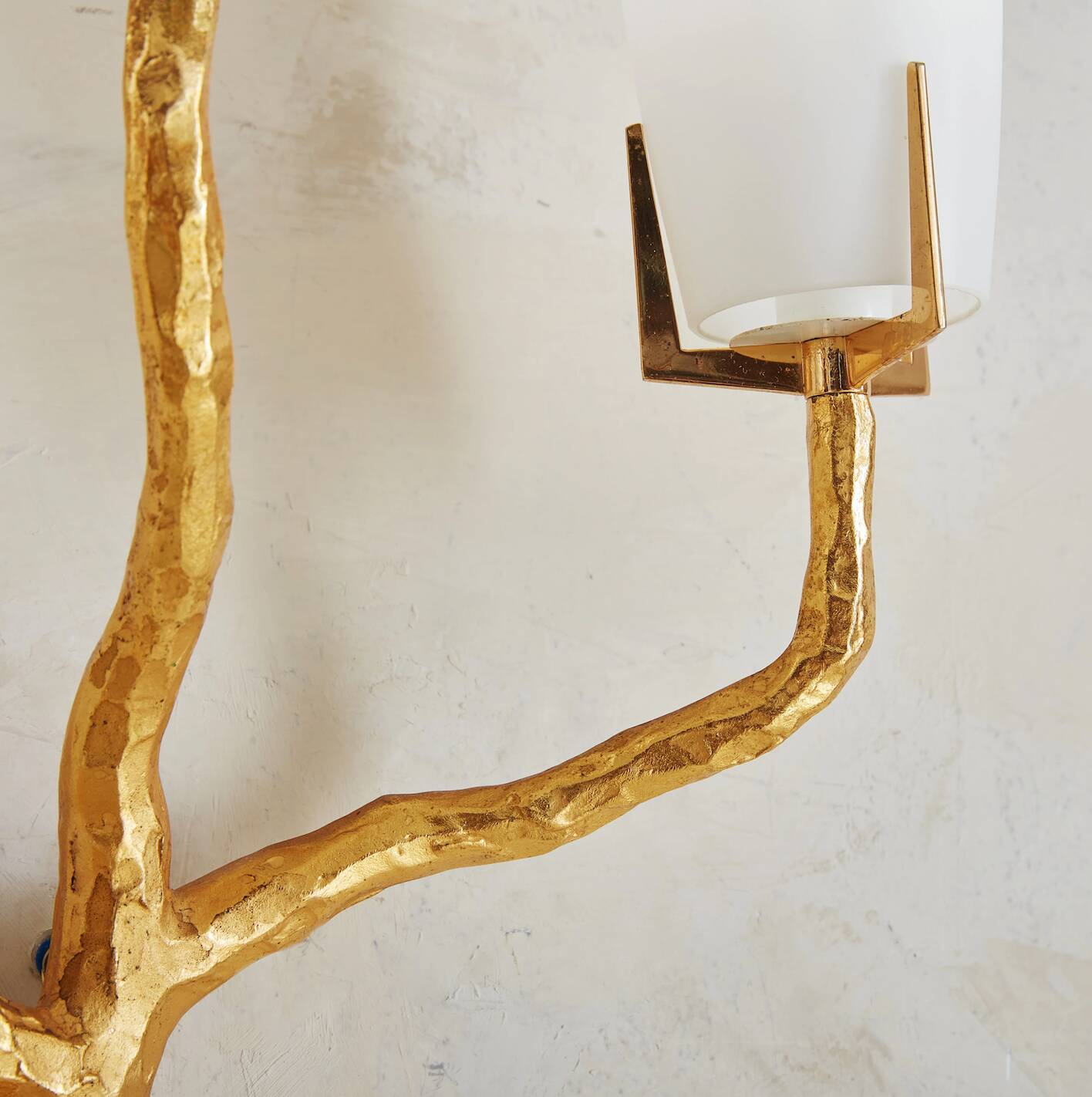 Pair of wall lights by Maison Arlus by Felix Agostini in bronze.