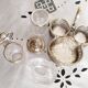 Salt, pepper and mustard shaker set in chiseled glass and silver metal