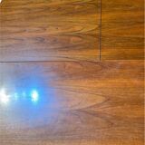 Baumann style wooden table with extensions.