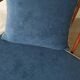 Pair of cozy teak armchairs with cushions
