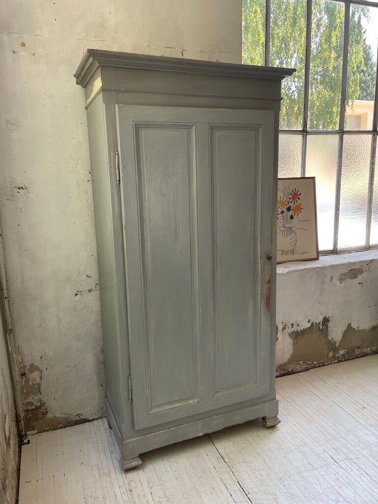 Blue patinated cap cabinet