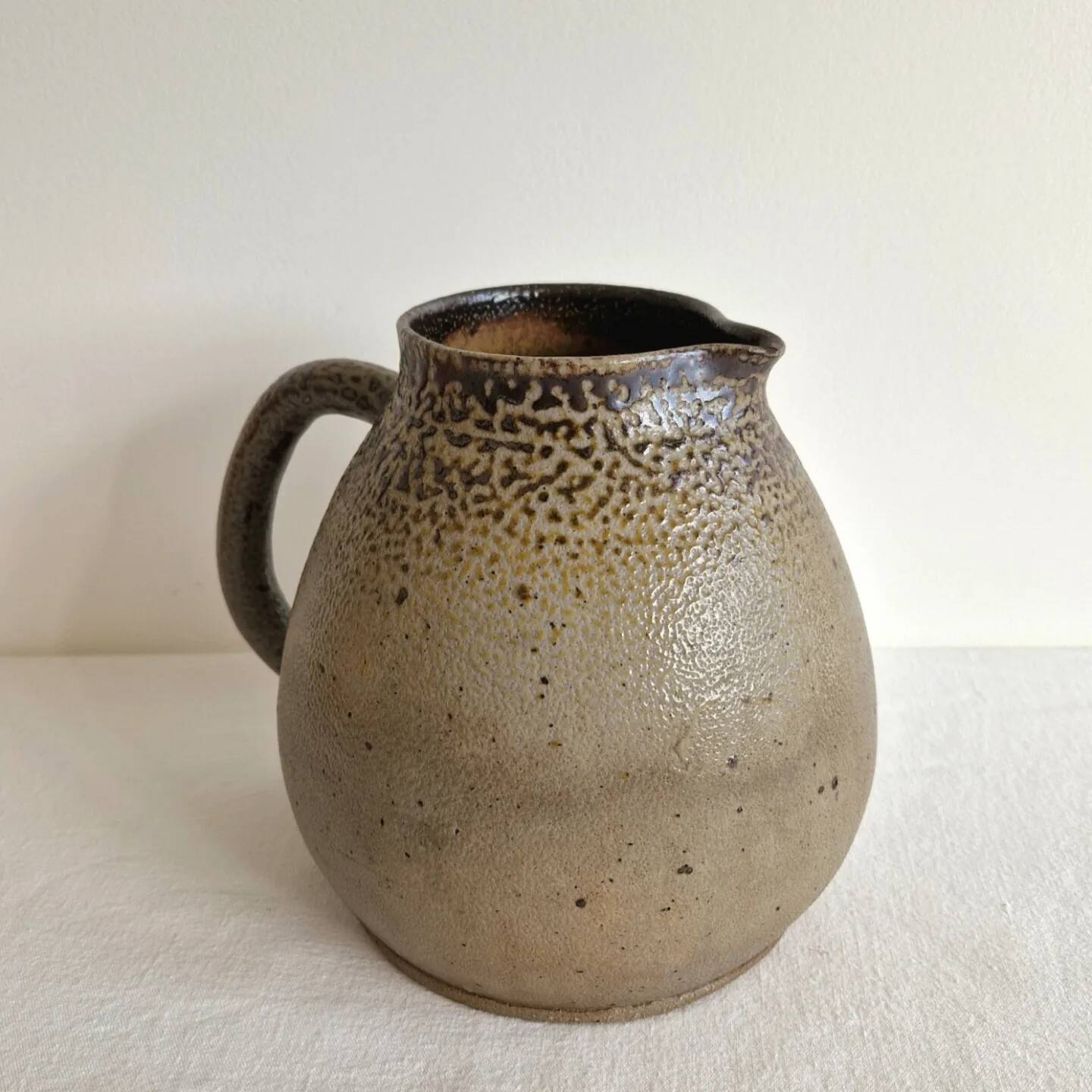 Impressive glazed stoneware pitcher