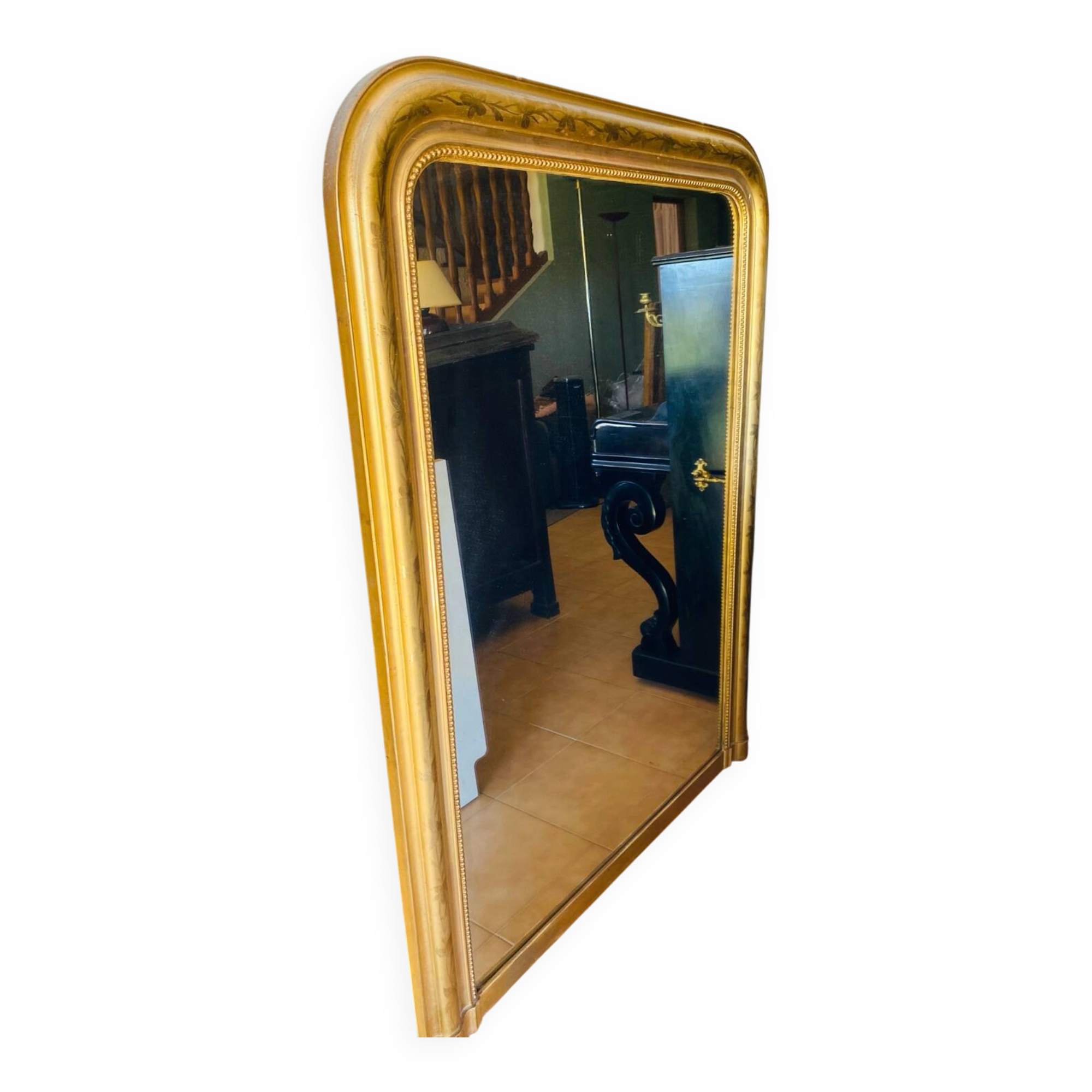 Large antique mirror with gold leaf in the Louis XV style.
