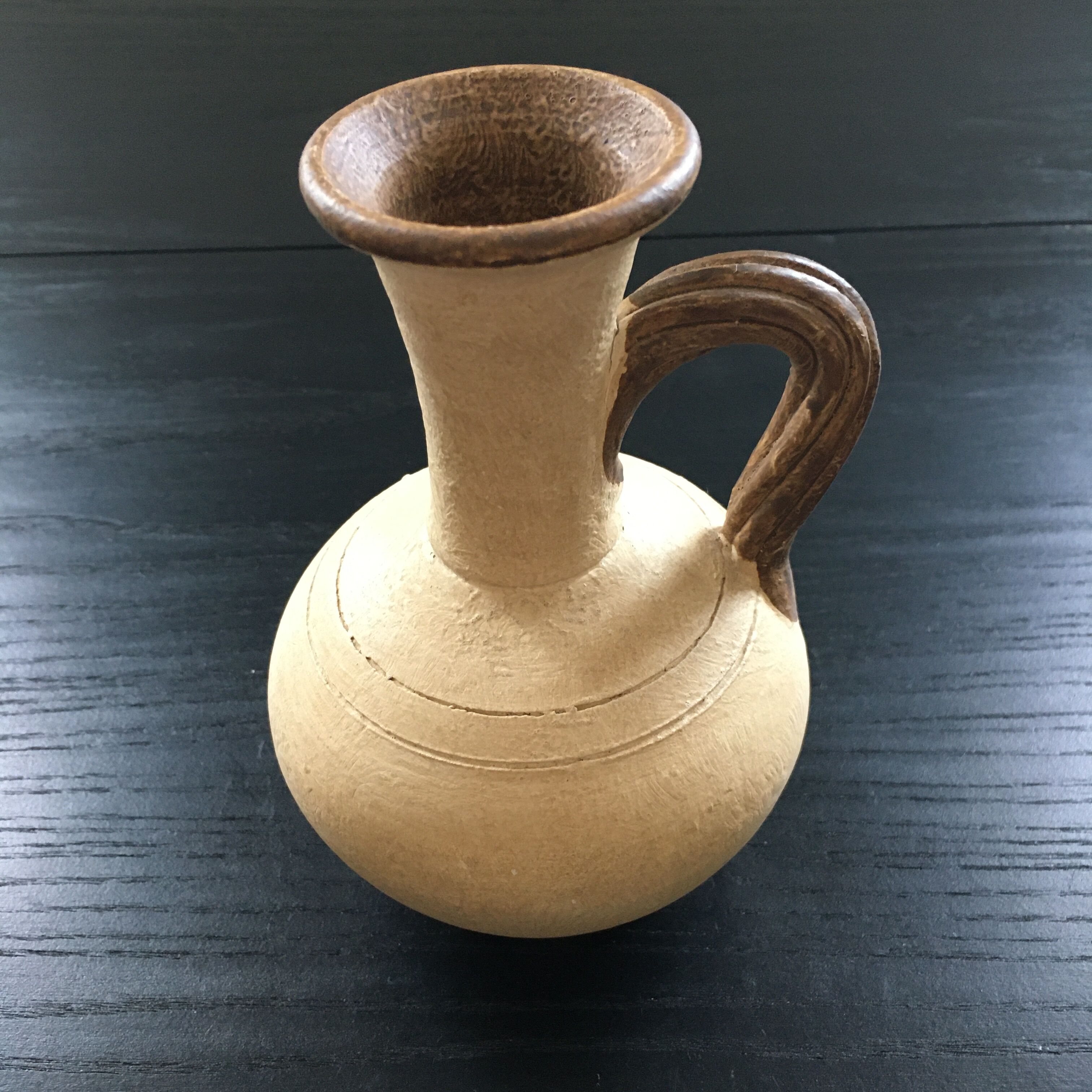 Trio of terracotta vases