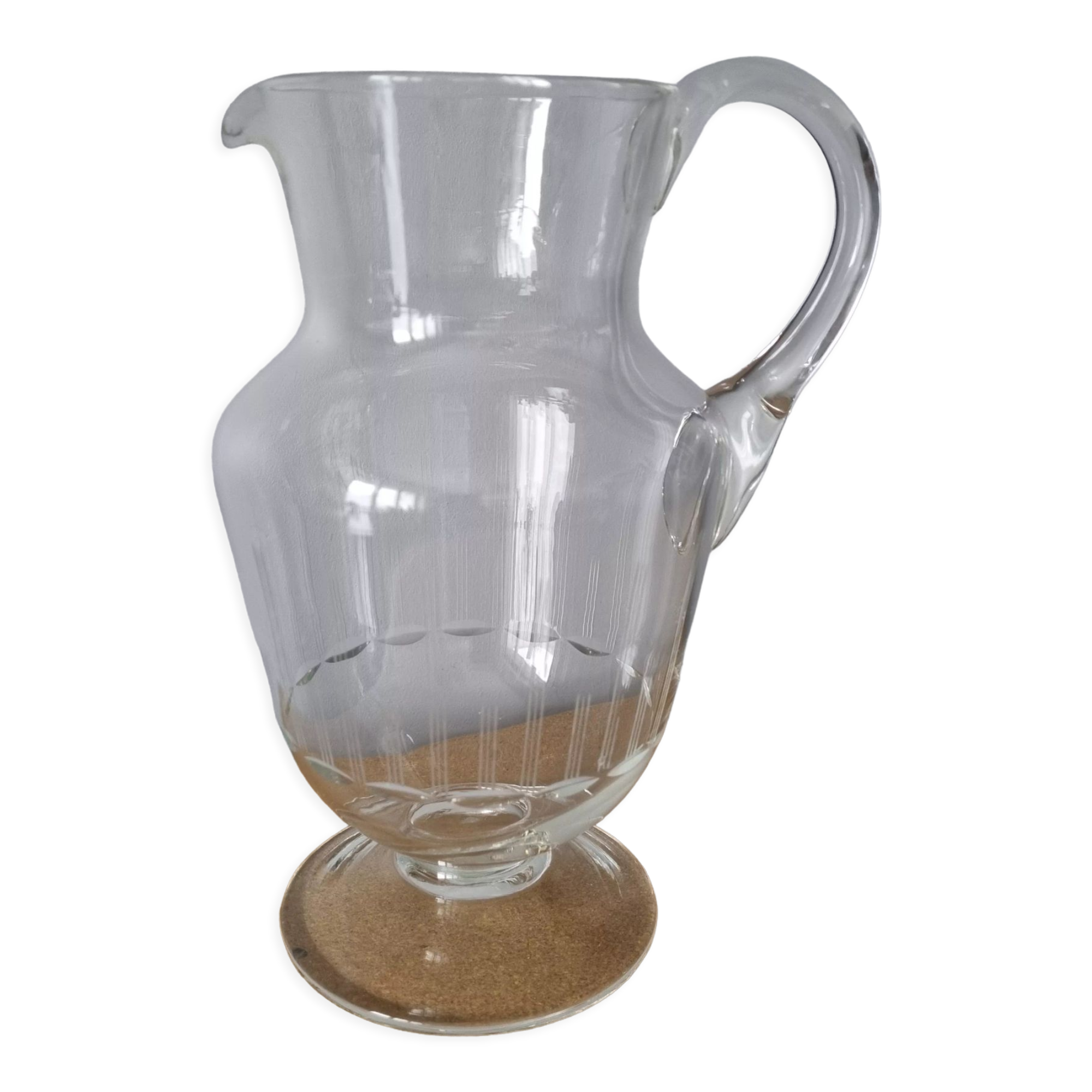 Antique pitcher in blown glass